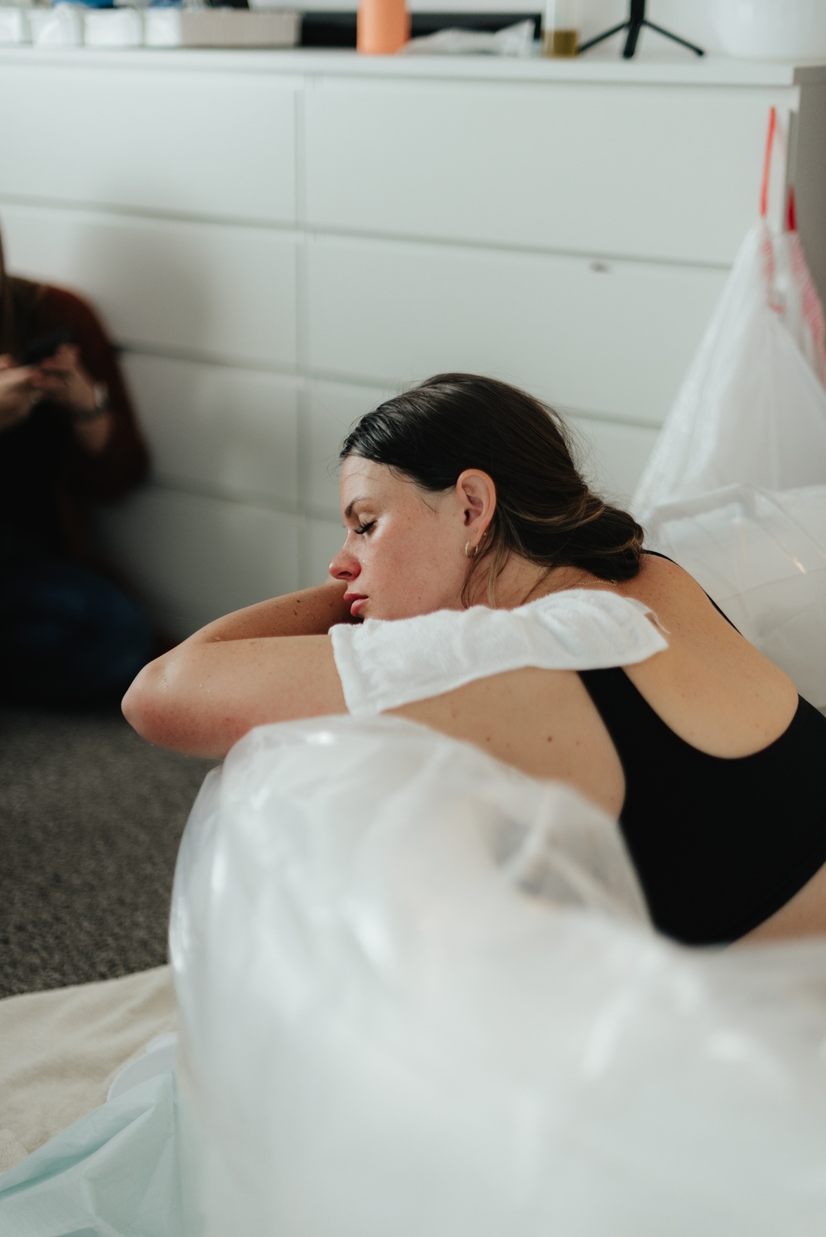 parent resting during labor, supported every step of the way